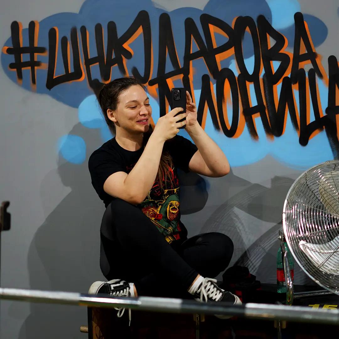 A member taking a photo in Superior Athlete